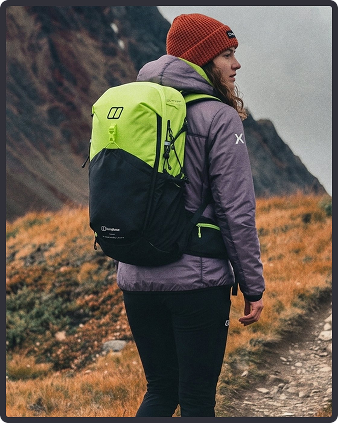 Walker on an autumn hillside with a lime and black daypack